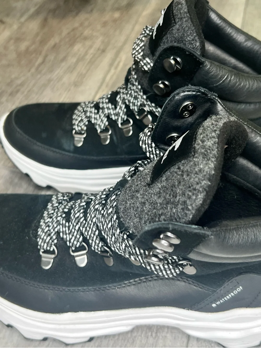 Sorel Black Lace-Up Winter Boots with White Accents